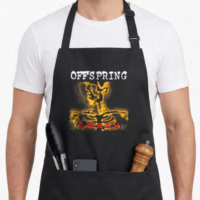 Offspring alternative apron - Glowing yellow skeleton torso with white Offspring text and red Smash lettering — shown on a black cotton canvas apron against a white background