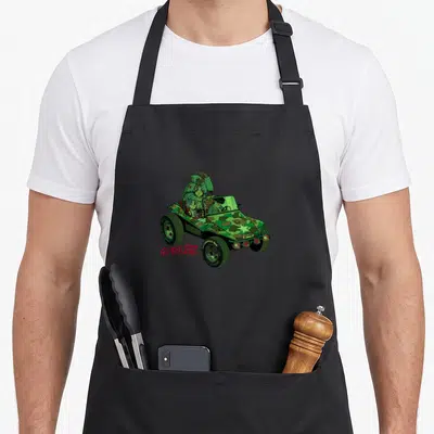 Gorillaz gorilla apron - Green camo jeep with four cartoon characters and red GORILLAZ logo — shown on a black cotton canvas apron against a white background