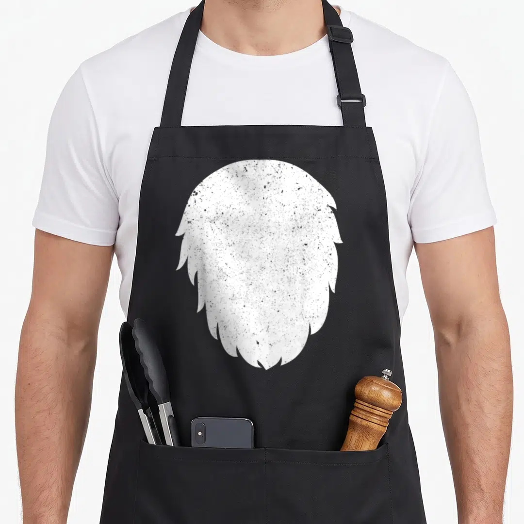 Costume fox print apron - White minimalist beard silhouette centered on grey background — shown on a black cotton canvas apron against a white background