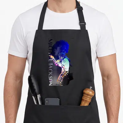 Jackson michaels apron for dad - Distressed blue and purple Michael Jackson holding a mic with vertical name text — shown on a black cotton canvas apron against a white background