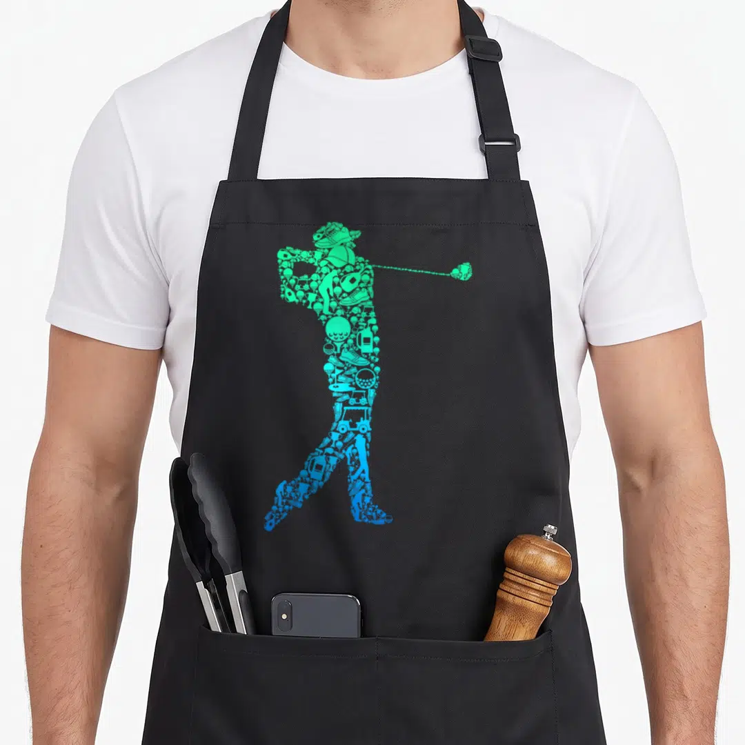 Golfer golfing golf apron - Golfer silhouette formed by golf icons in green-to-blue gradient — shown on a black cotton canvas apron against a white background