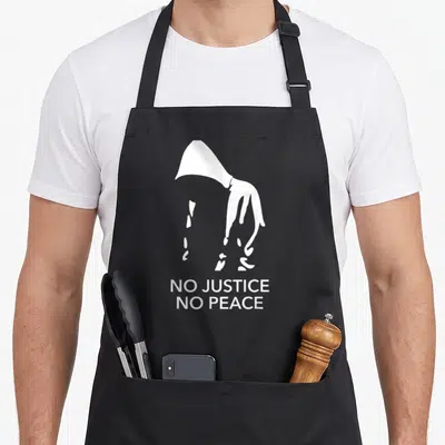 Live justice of the peace apron - White hooded silhouette above white text reading NO JUSTICE NO PEACE — shown on a black cotton canvas apron against a white background