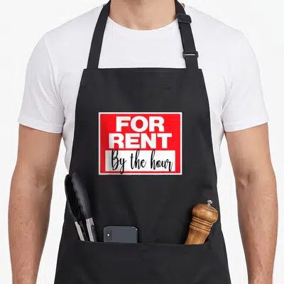 Hour best business ever apron - Red rectangular sign with white FOR RENT text and By the hour script on a white banner — shown on a black cotton canvas apron against a white background