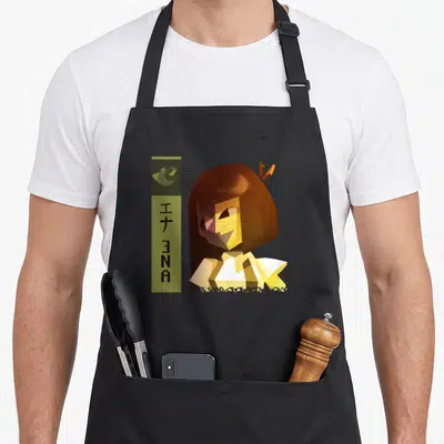 Funny ena novelty apron - Pixel art character Ena with vertical olive rectangle and Japanese text — shown on a black cotton canvas apron against a white background