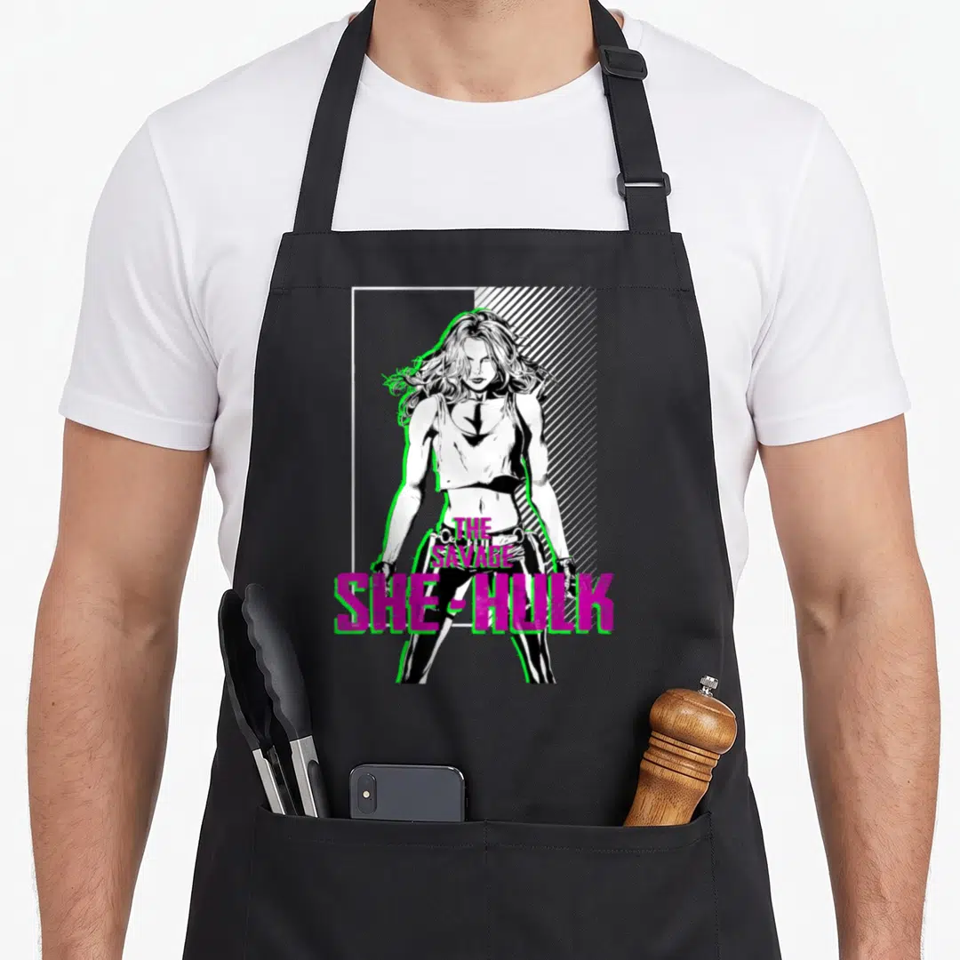 Pop savage apron - She-Hulk line art with magenta text THE SAVAGE SHE-HULK on striped background — shown on a black cotton canvas apron against a white background