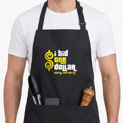 Bid dollar aprons - Yellow dollar sign with stacked white and yellow text reading i bid one dollar sorry not sorry — shown on a black cotton canvas apron against a white background