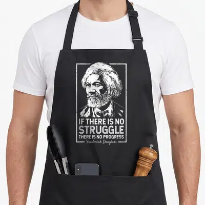 Douglas frederick maryland apron - White distressed portrait of Frederick Douglass with quote If There Is No Struggle — shown on a black cotton canvas apron against a white background