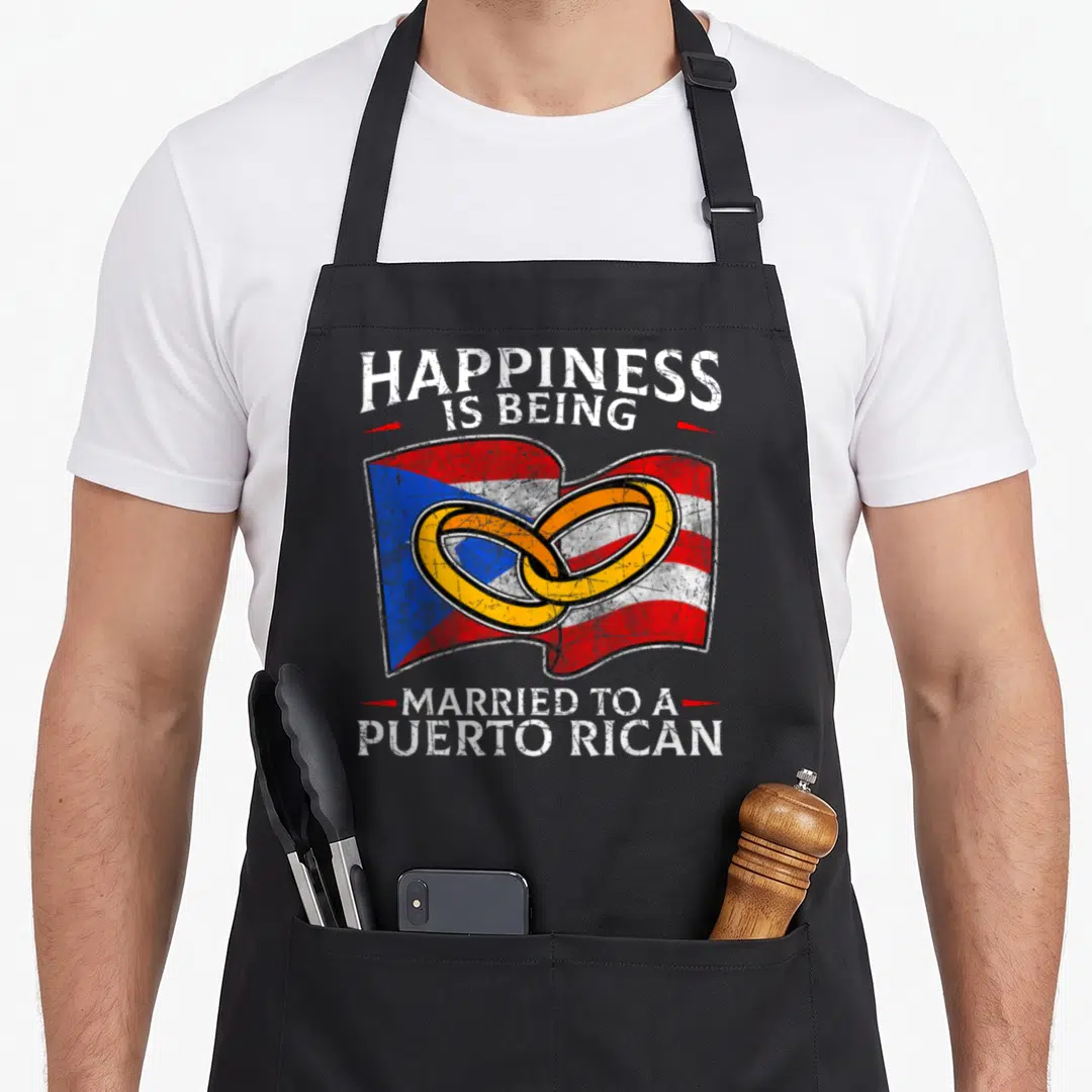 Puerto wedding apron - Distressed flag with two interlocking rings and white text reading Happiness Is Being Married — shown on a black cotton canvas apron against a white background