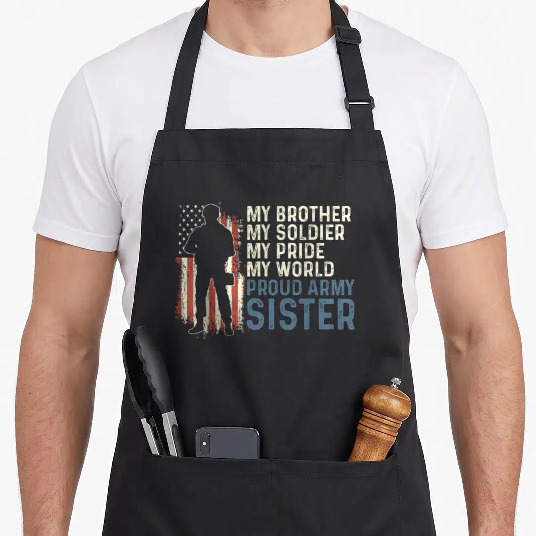 Brother army apron - Soldier silhouette beside distressed flag with My Brother My Soldier My Pride My World Proud Army — shown on a black cotton canvas apron against a white background