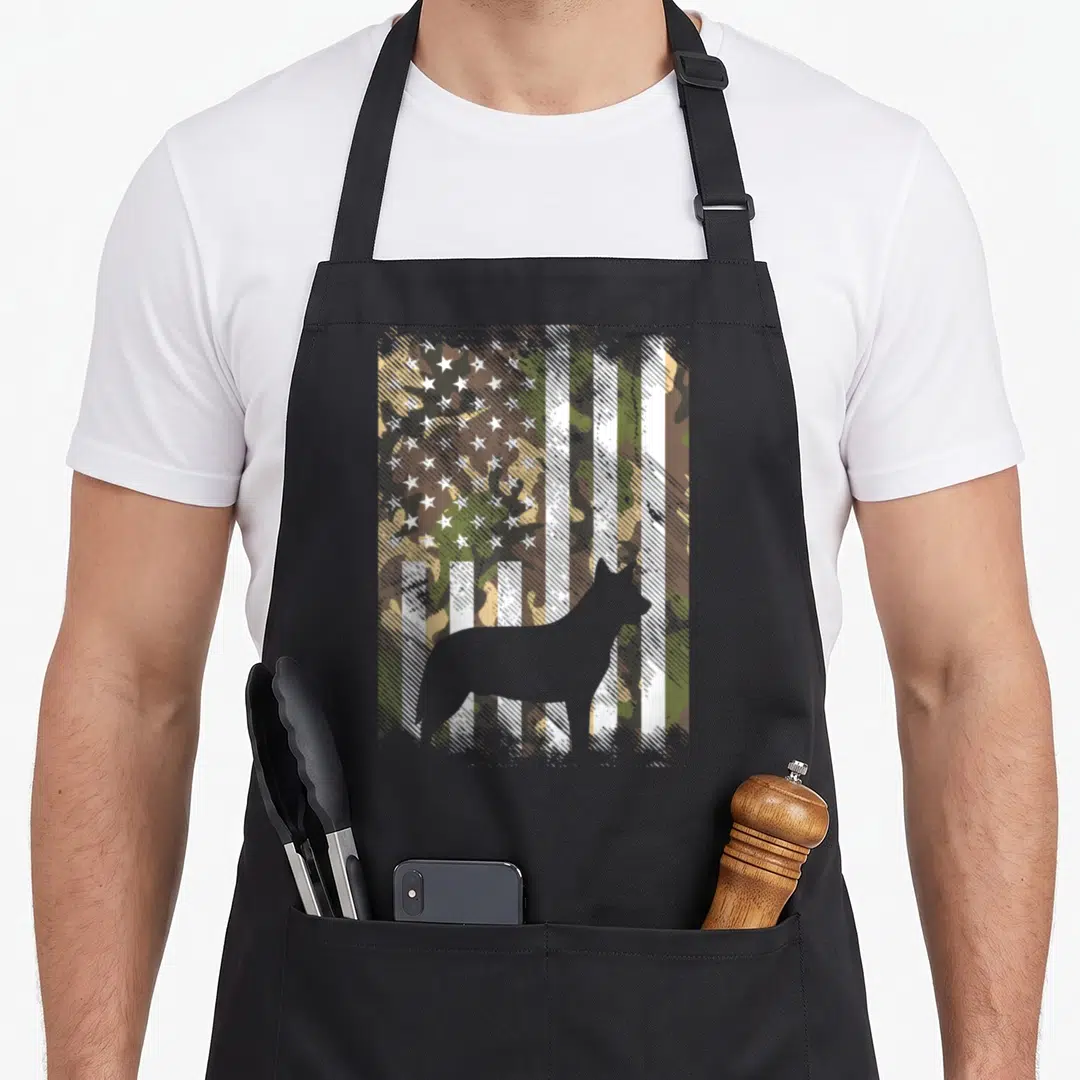 Cattle american flag apron - Grey dog silhouette standing in front of a distressed camouflage American flag pattern — shown on a black cotton canvas apron against a white background