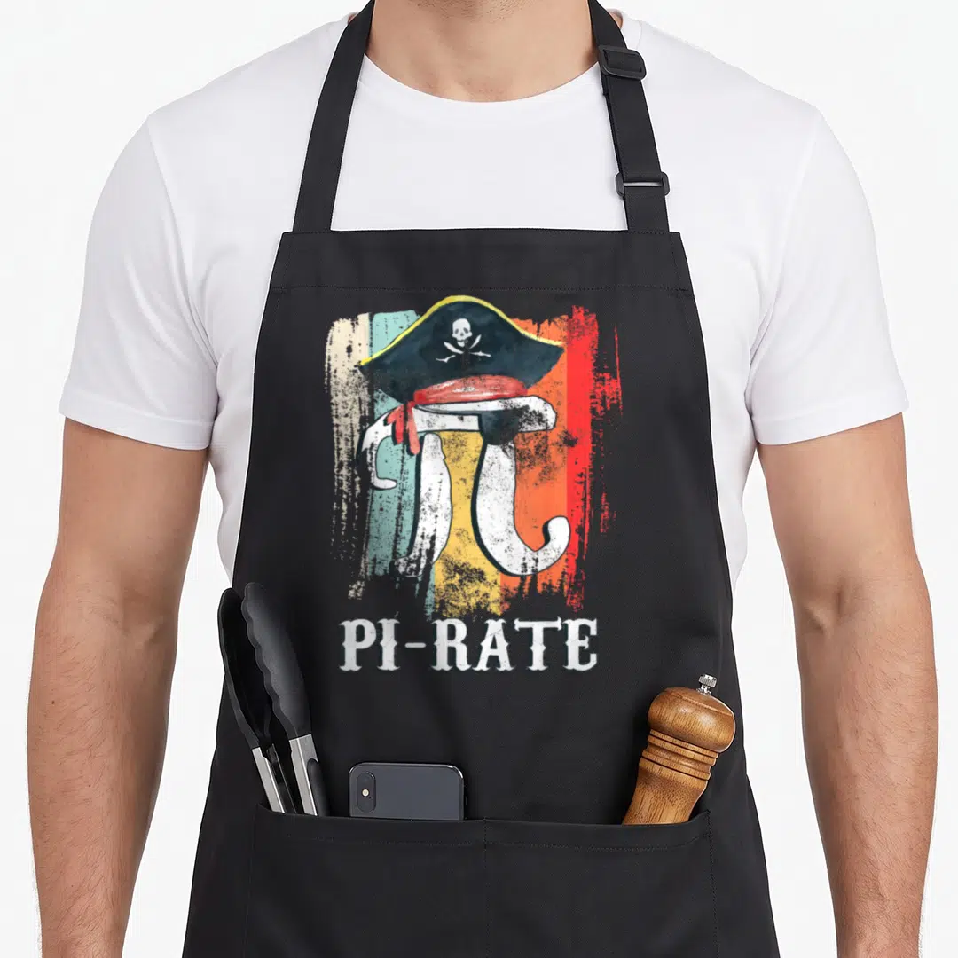 Rate geek apron - Distressed pi symbol in pirate hat on colored stripes with PI-RATE text below — shown on a black cotton canvas apron against a white background