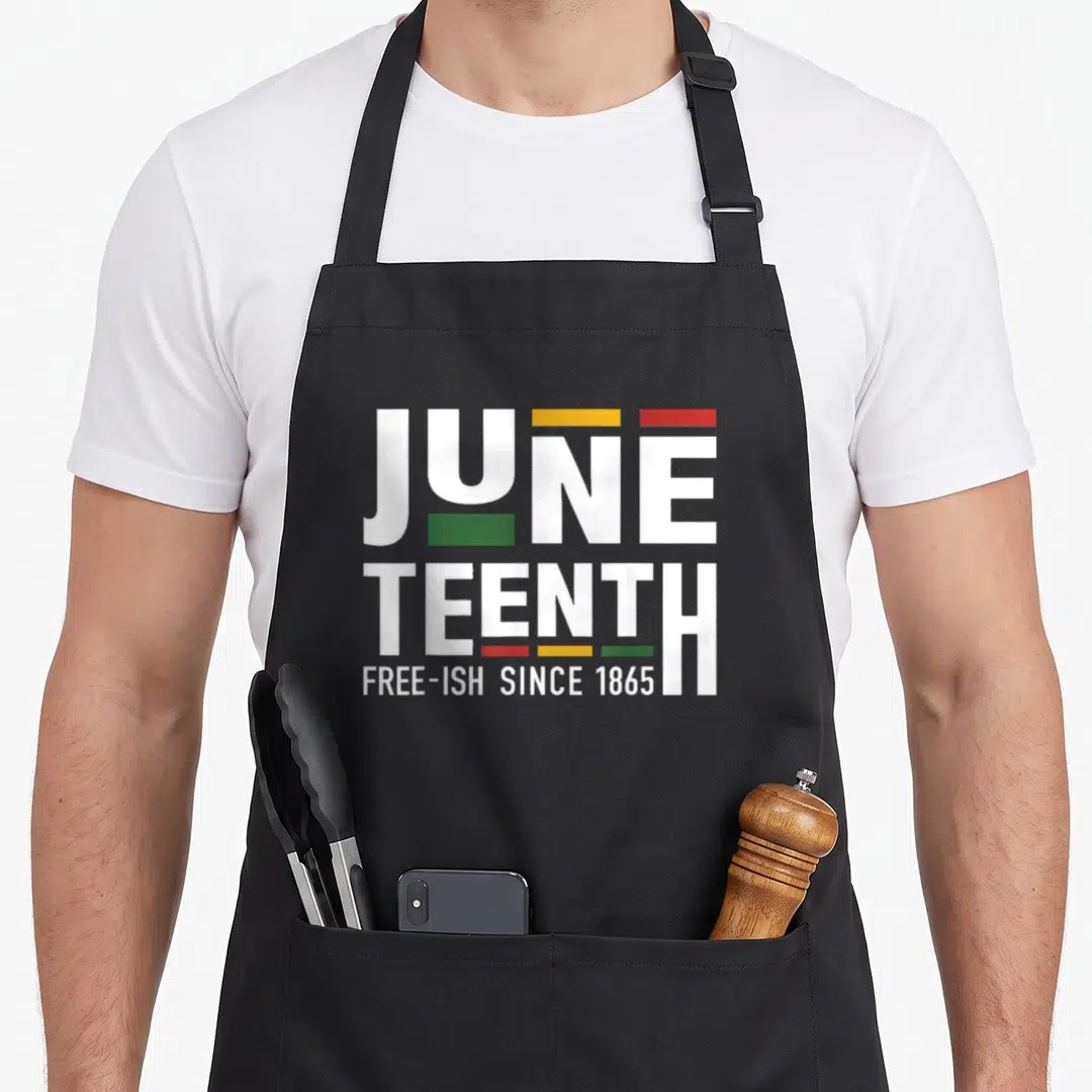 Juneteenth freeish african apron - White JUNE TEENTH FREE-ISH SINCE 1865 text with red yellow green rectangles — shown on a black cotton canvas apron against a white background