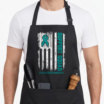 Ovarian sister squad apron - Teal ribbon over distressed white flag with vertical support squad text — shown on a black cotton canvas apron against a white background