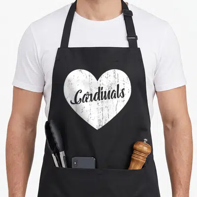 Sport cardinal apron - White heart with grey distressed Cardinals script centered on the panel — shown on a black cotton canvas apron against a white background