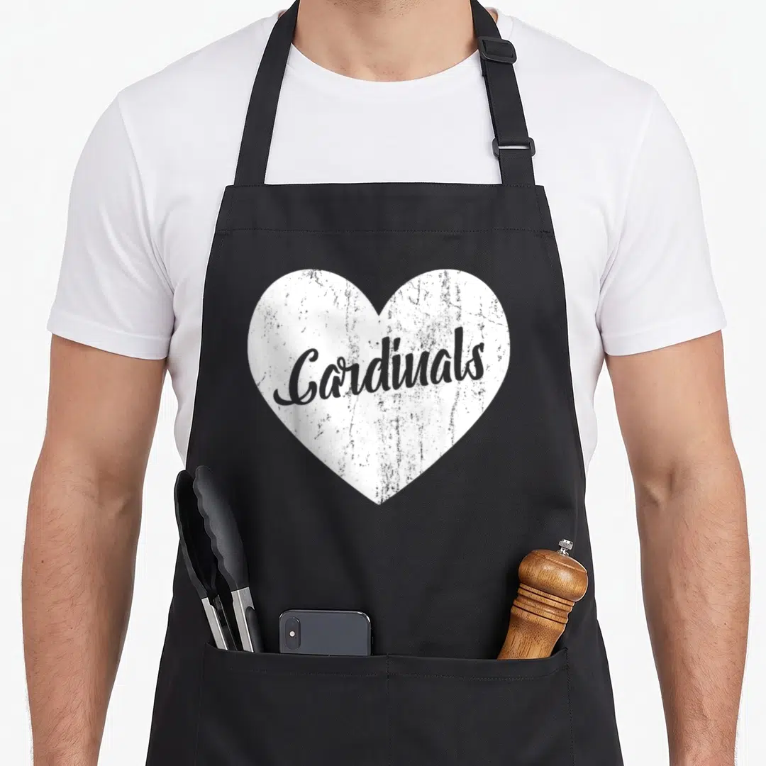 Sport cardinal apron - White heart with grey distressed Cardinals script centered on the panel — shown on a black cotton canvas apron against a white background