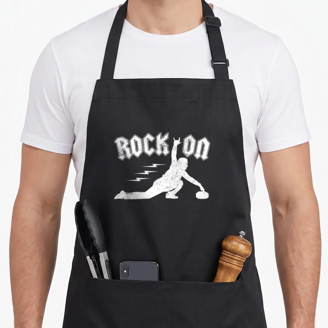 Roll winter apron - White distressed ROCK ON text above curling silhouette with lightning bolts — shown on a black cotton canvas apron against a white background