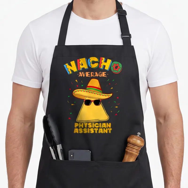 Nacho physician apron - Cartoon chip in sombrero and sunglasses with NACHO AVERAGE PHYSICIAN ASSISTANT text — shown on a black cotton canvas apron against a white background