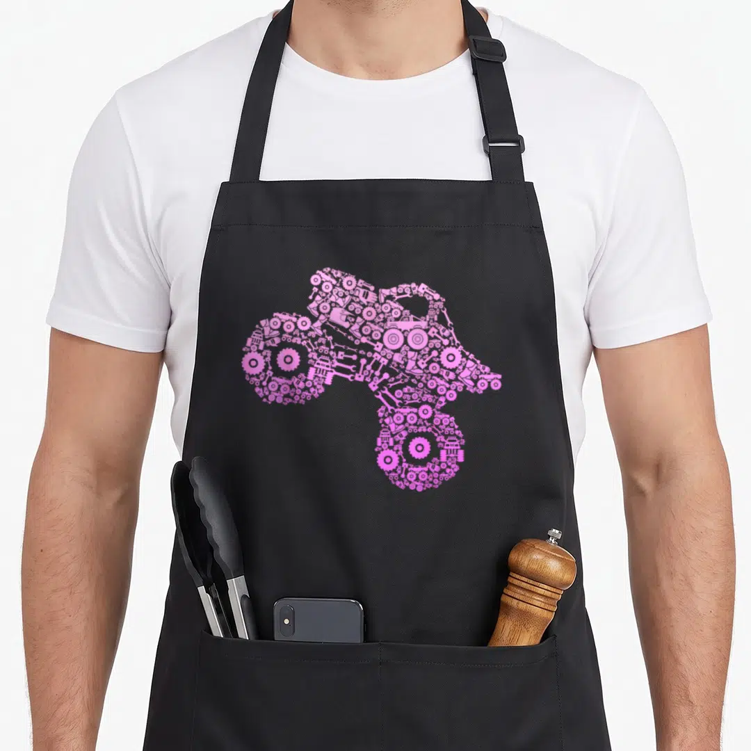 Retro monster truck aprons - Pink monster truck silhouette formed by gears and wrenches on canvas — shown on a black cotton canvas apron against a white background
