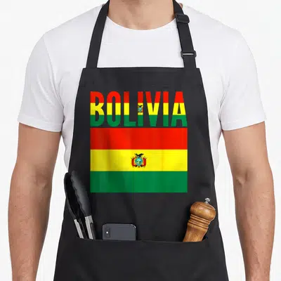 Bolivia country apron - BOLIVIA text filled with red yellow green stripes above rectangular flag with coat of arms — shown on a black cotton canvas apron against a white background