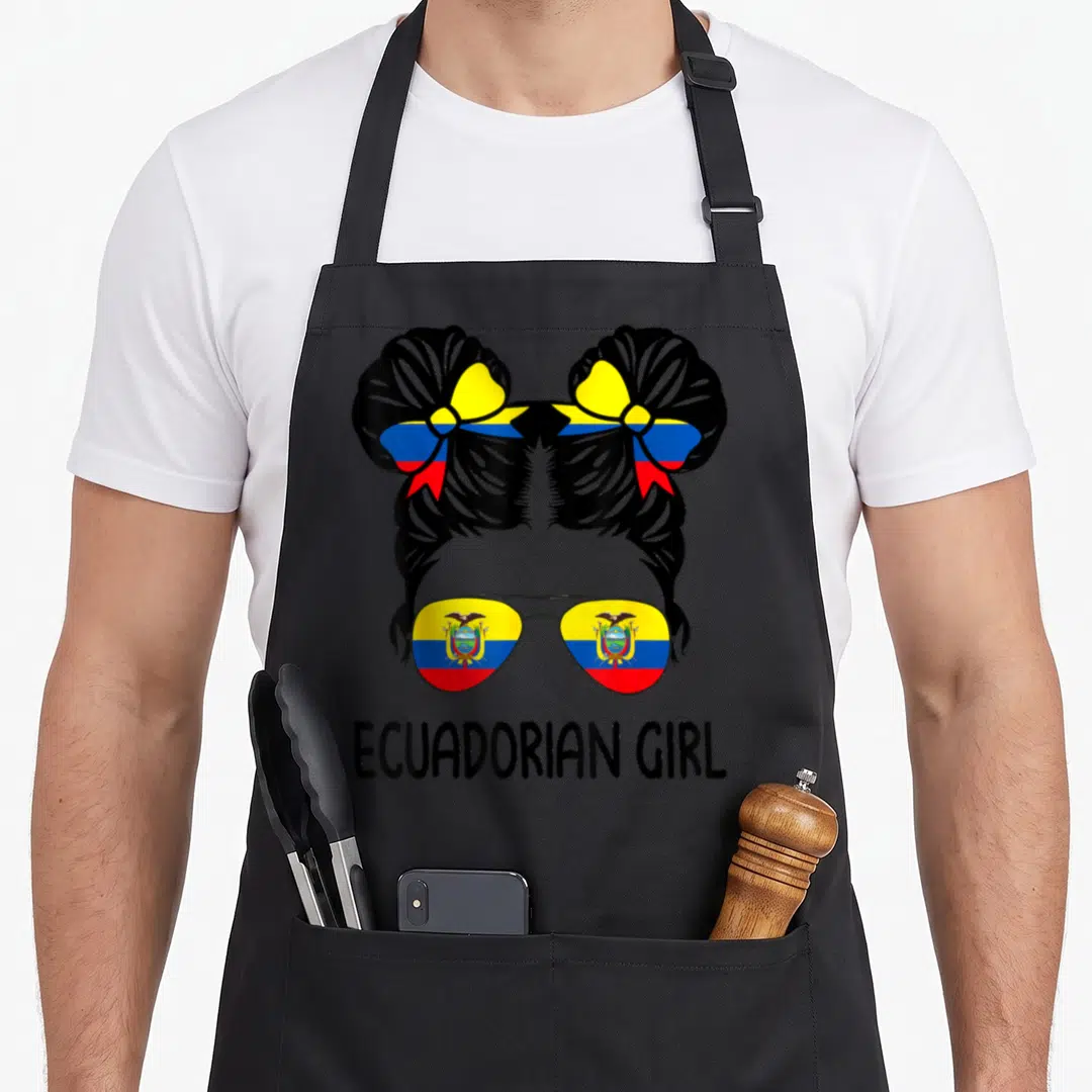 Ecuadorian messy aprons - Girl silhouette with flag-filled sunglasses and two buns, text reads ECUADORIAN GIRL — shown on a black cotton canvas apron against a white background