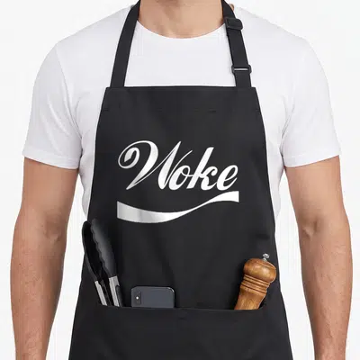 Woke stay apron - White Woke text and swoosh on black bib apron — shown on a black cotton canvas apron against a white background