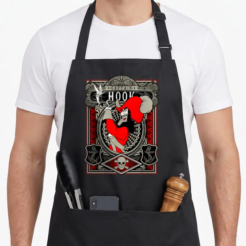 Peter hooks for aprons - Retro Captain Hook illustration in red and black with Tinker Bell and skull — shown on a black cotton canvas apron against a white background
