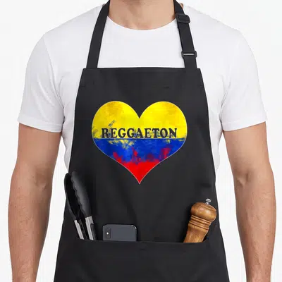 Reggaeton music lover apron - Heart with yellow blue red flag pattern and grey REGGAETON text — shown on a black cotton canvas apron against a white background