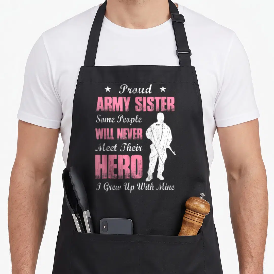 Army female veteran apron - Pink and white distressed soldier silhouette with Proud Army Sister text — shown on a black cotton canvas apron against a white background