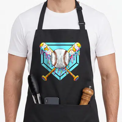 Sweet ice cream apron - Cartoon baseball and two crossed bats with dripping yellow pink and blue glaze on light blue — shown on a black cotton canvas apron against a white background