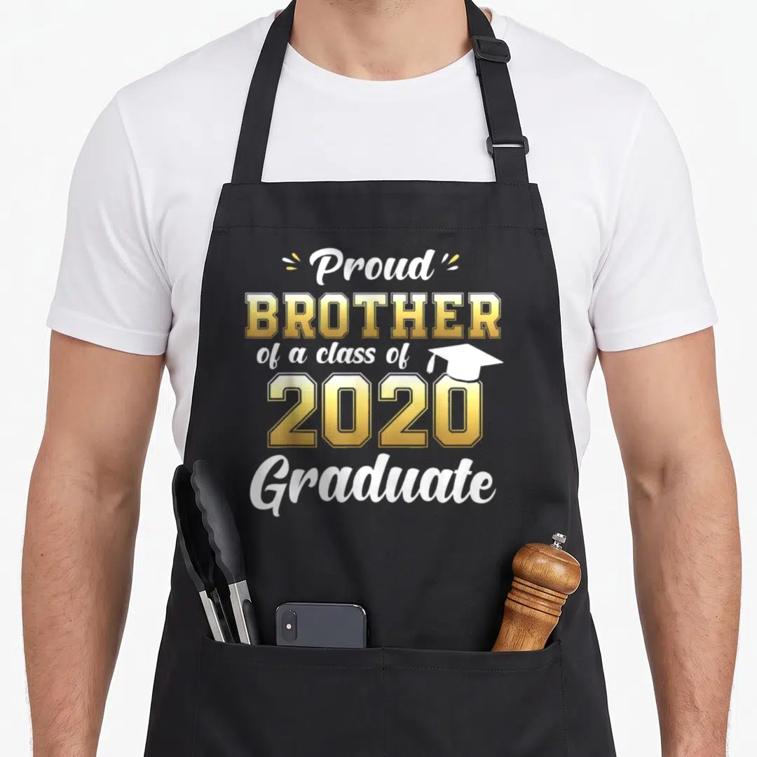 Brother miss grade apron - Proud brother of a class of 2020 graduate text with small cap icon in gold and white — shown on a black cotton canvas apron against a white background