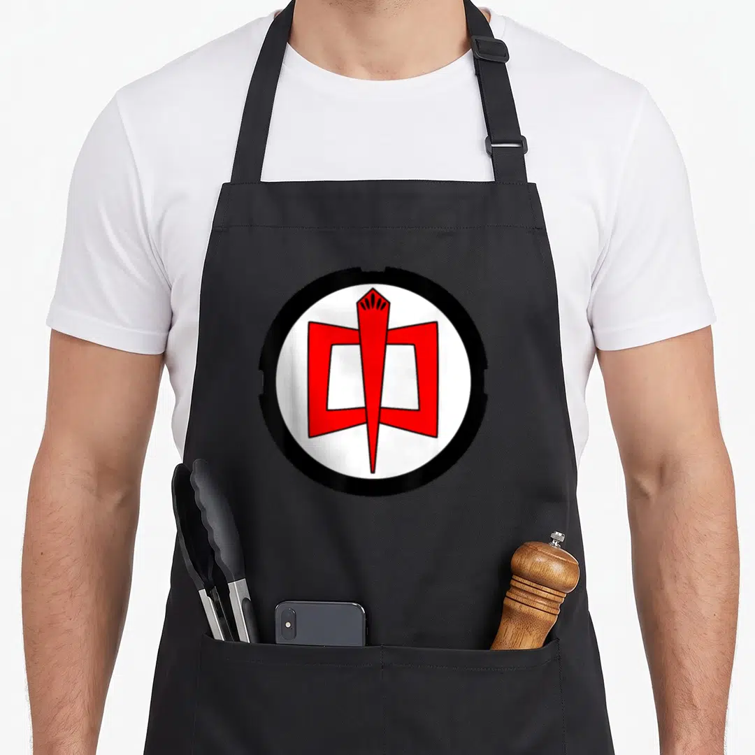 Hero worlds greatest apron - Red geometric symbol inside black circle on white background — shown on a black cotton canvas apron against a white background