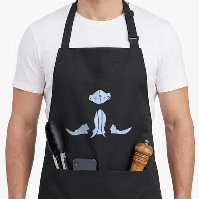 Eeyore simple apron - Grey cartoon donkey sitting centrally with light blue muzzle and belly patches — shown on a black cotton canvas apron against a white background