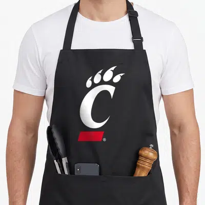 Bearcat cincinnati apron - White C with four claws above and red rectangle below — shown on a black cotton canvas apron against a white background