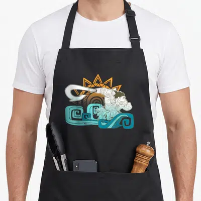 Maui hooks for aprons - Line art warrior with hook sword, orange sun, and blue stylized waves — shown on a black cotton canvas apron against a white background