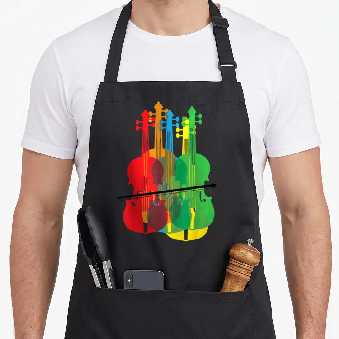 Multicolored birthday apron - Five overlapping violins in red orange blue yellow and green with a black bow — shown on a black cotton canvas apron against a white background