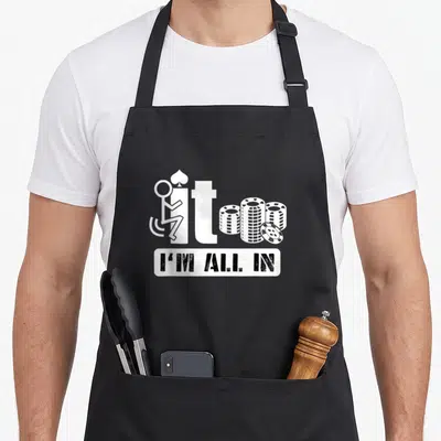 Poker casino aprons - Wheelchair figure on letter i next to chip stacks above I'M ALL IN text — shown on a black cotton canvas apron against a white background