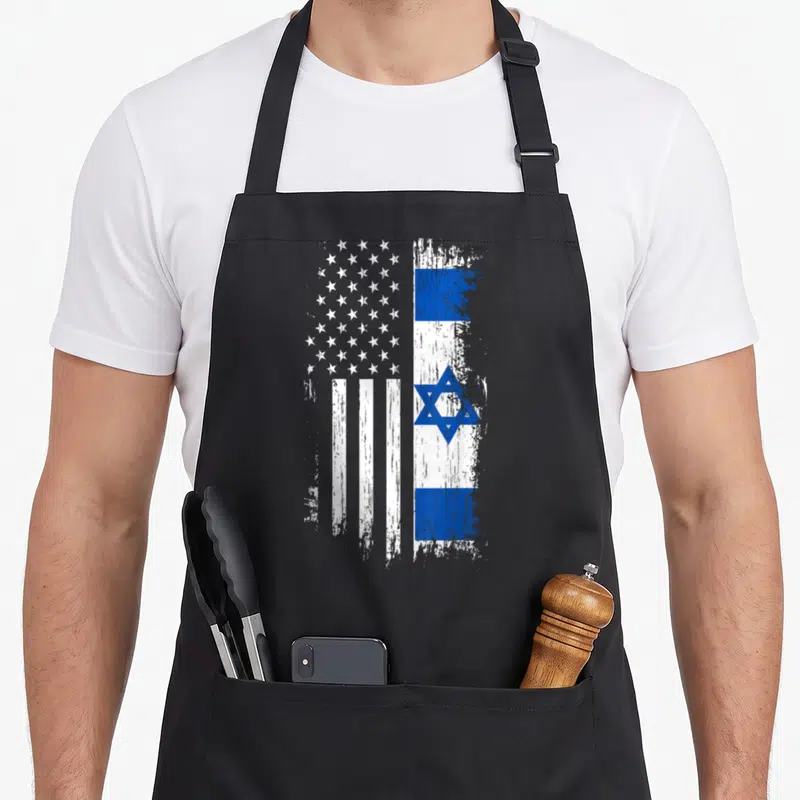 Israeli american flag apron - Distressed composite flag with USA stars stripes and Israeli star of David in blue white — shown on a black cotton canvas apron against a white background