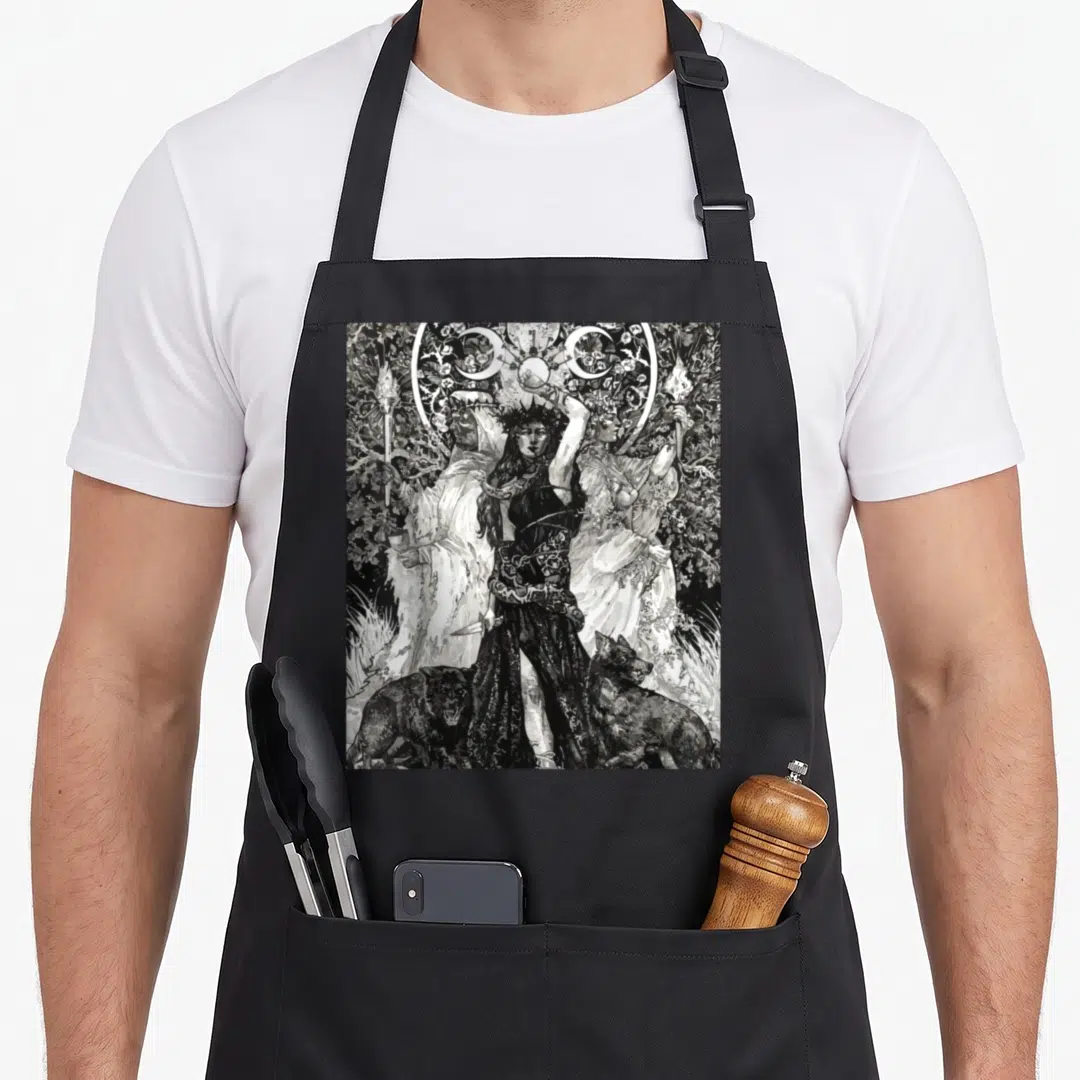 Wiccan witch apron - Line art of woman in black and white with two wolves, moons, torches, and floral border — shown on a black cotton canvas apron against a white background