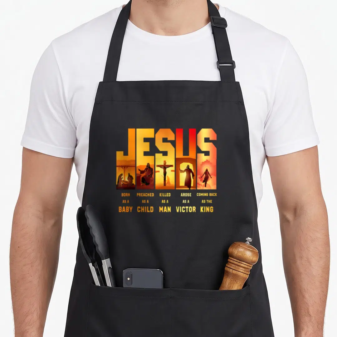Jesus a's aprons - Orange JESUS text framing five vertical biblical scenes with descriptive captions below — shown on a black cotton canvas apron against a white background