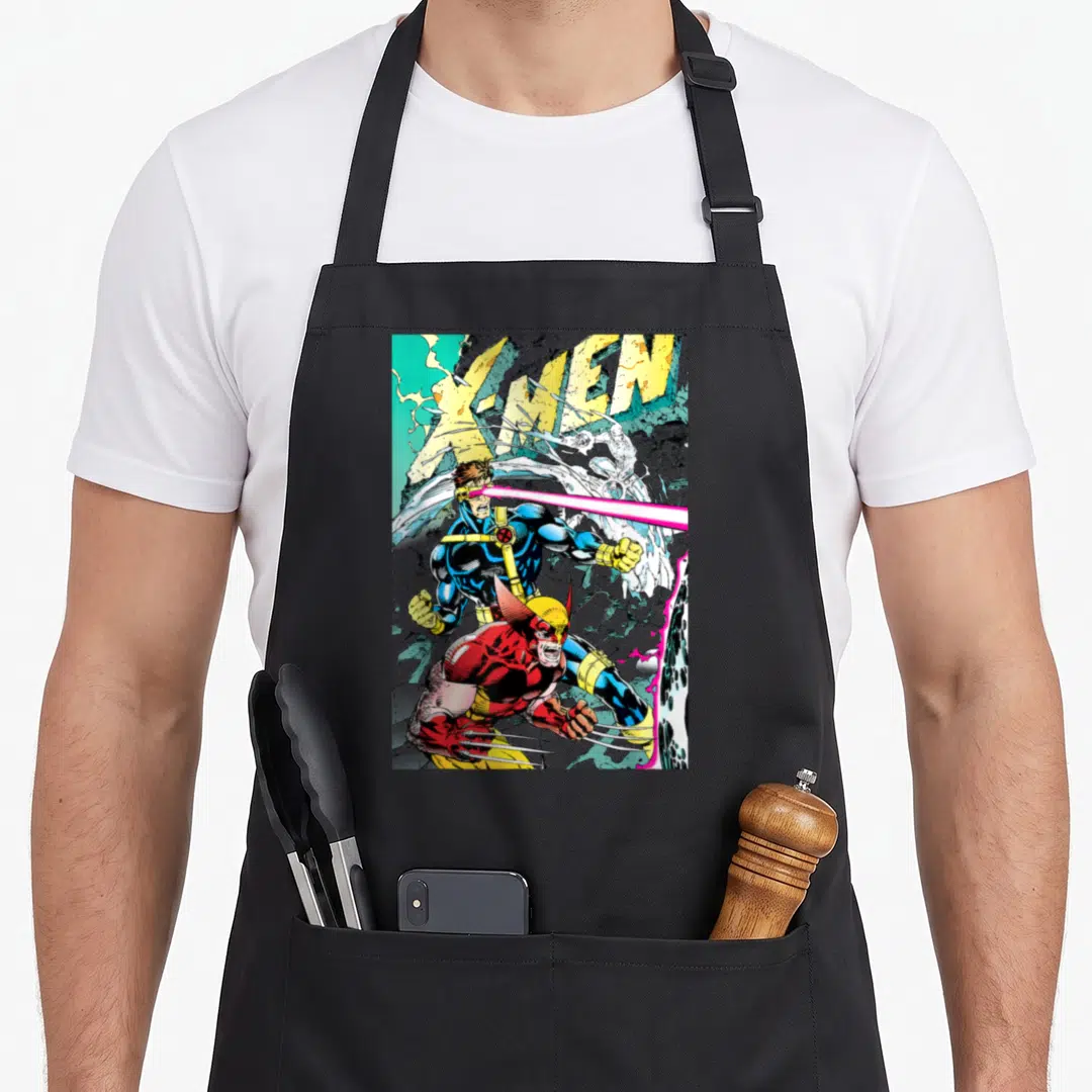 Fighting x apron - Cyclops optic blast and Wolverine claws with X-MEN text in blue yellow red white cartoon style — shown on a black cotton canvas apron against a white background