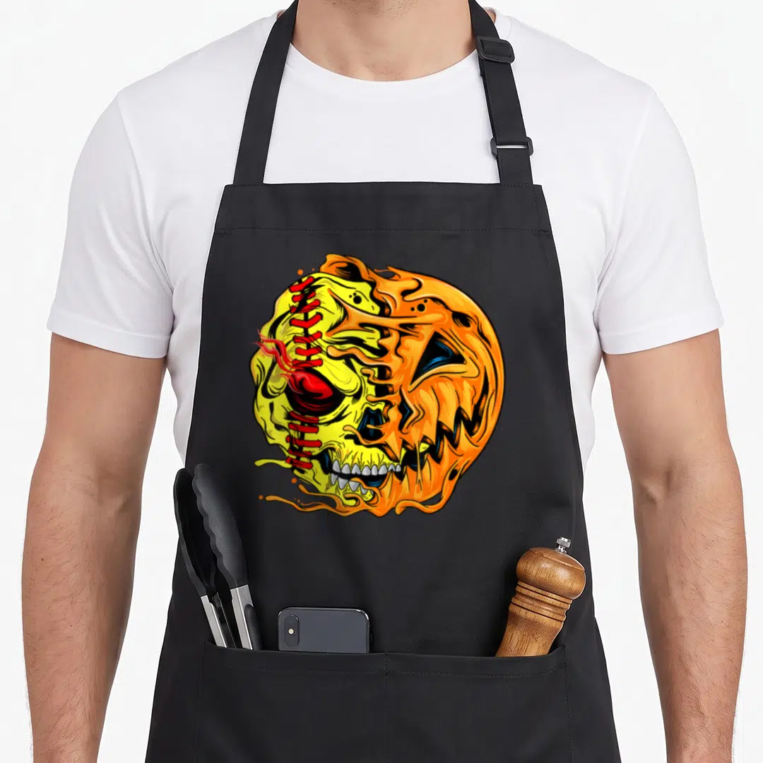 Softball halloween apron - Cartoon pumpkin skull hybrid with red stitching and orange melting details — shown on a black cotton canvas apron against a white background