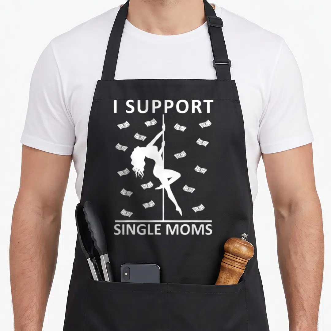 Support single mom apron - White I SUPPORT SINGLE MOMS text with pole dancer silhouette and floating money bills — shown on a black cotton canvas apron against a white background