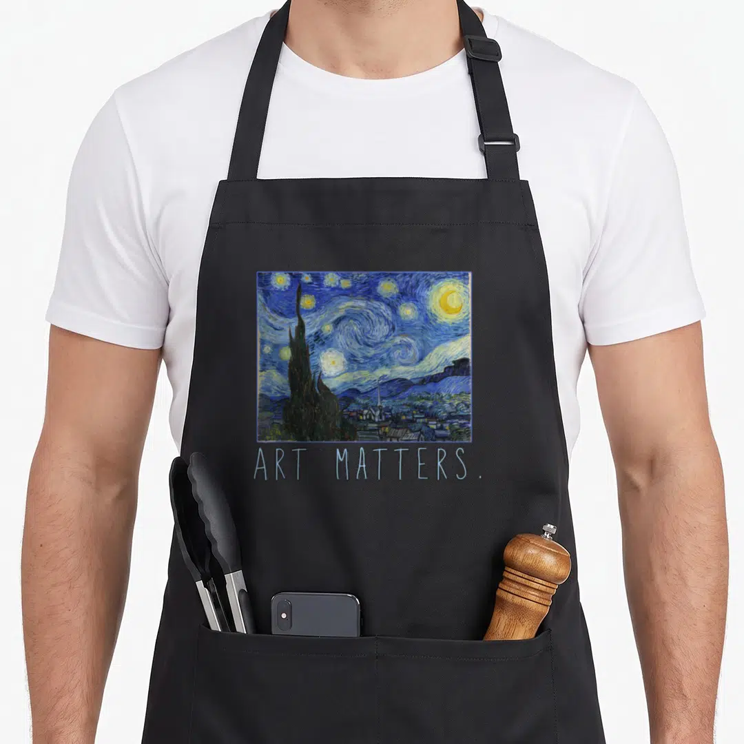 Matter van gogh apron - Starry Night painting print with ART MATTERS text below — shown on a black cotton canvas apron against a white background
