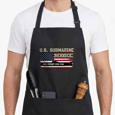 Permit father day apron - USS Permit SSN-594 submarine silhouette on distressed American flag with U.S. SUBMARINE — shown on a black cotton canvas apron against a white background