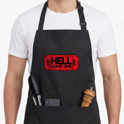 Hell agnostic apron - Red distressed ticket reading HELL ADMIT ONE with vertical 999 numbers on left and right — shown on a black cotton canvas apron against a white background