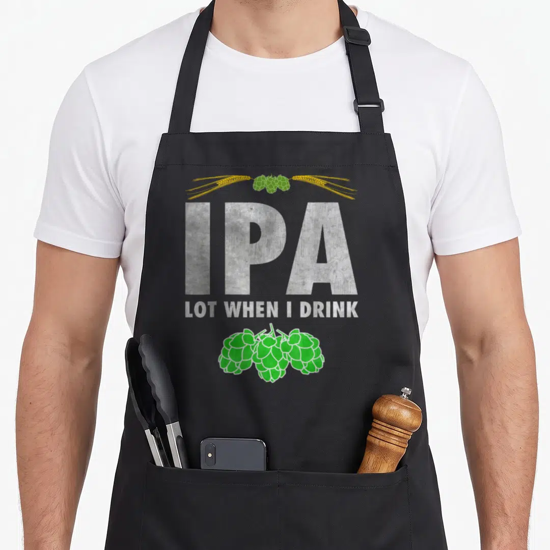 Ipa lot craft apron - Distressed white IPA text with green hops and yellow wheat on black fabric — shown on a black cotton canvas apron against a white background