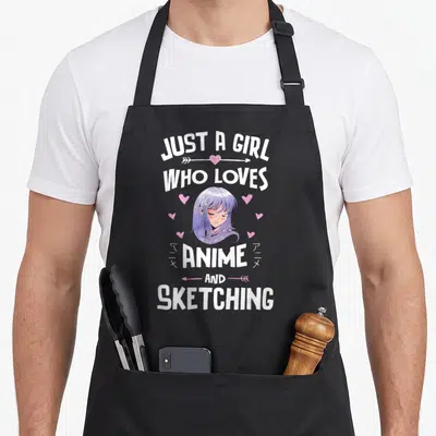 Cute sketching anime apron - Anime girl with purple hair and text JUST A GIRL WHO LOVES ANIME AND SKETCHING surrounded — shown on a black cotton canvas apron against a white background