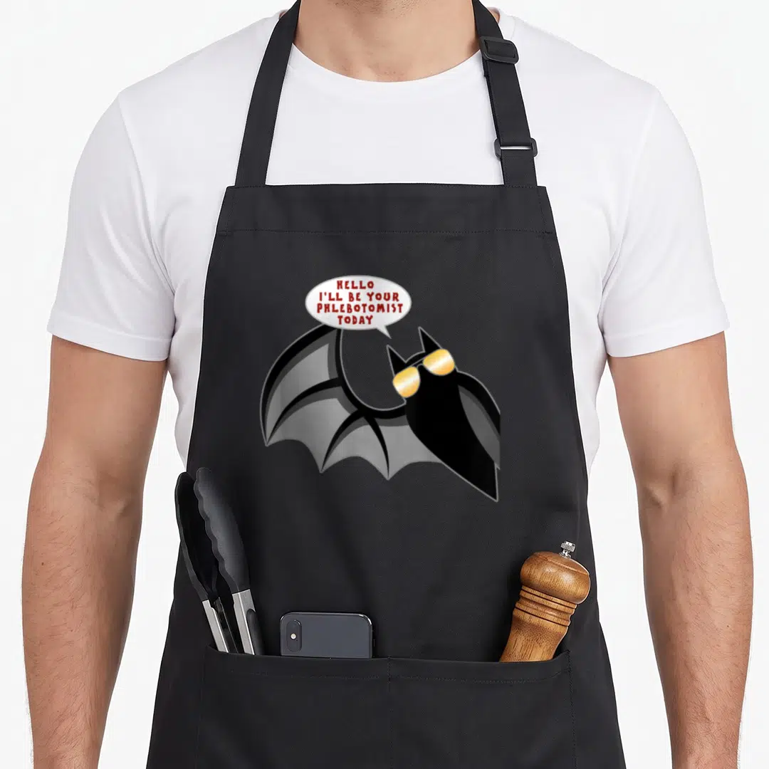 Phlebotomist bat apron - Cartoon black bat with yellow sunglasses and speech bubble text — shown on a black cotton canvas apron against a white background
