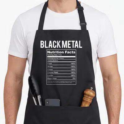 Nutrition heavy metal apron - White typography nutrition facts label parody listing Frost, Chaos, and Corpse Paint — shown on a black cotton canvas apron against a white background