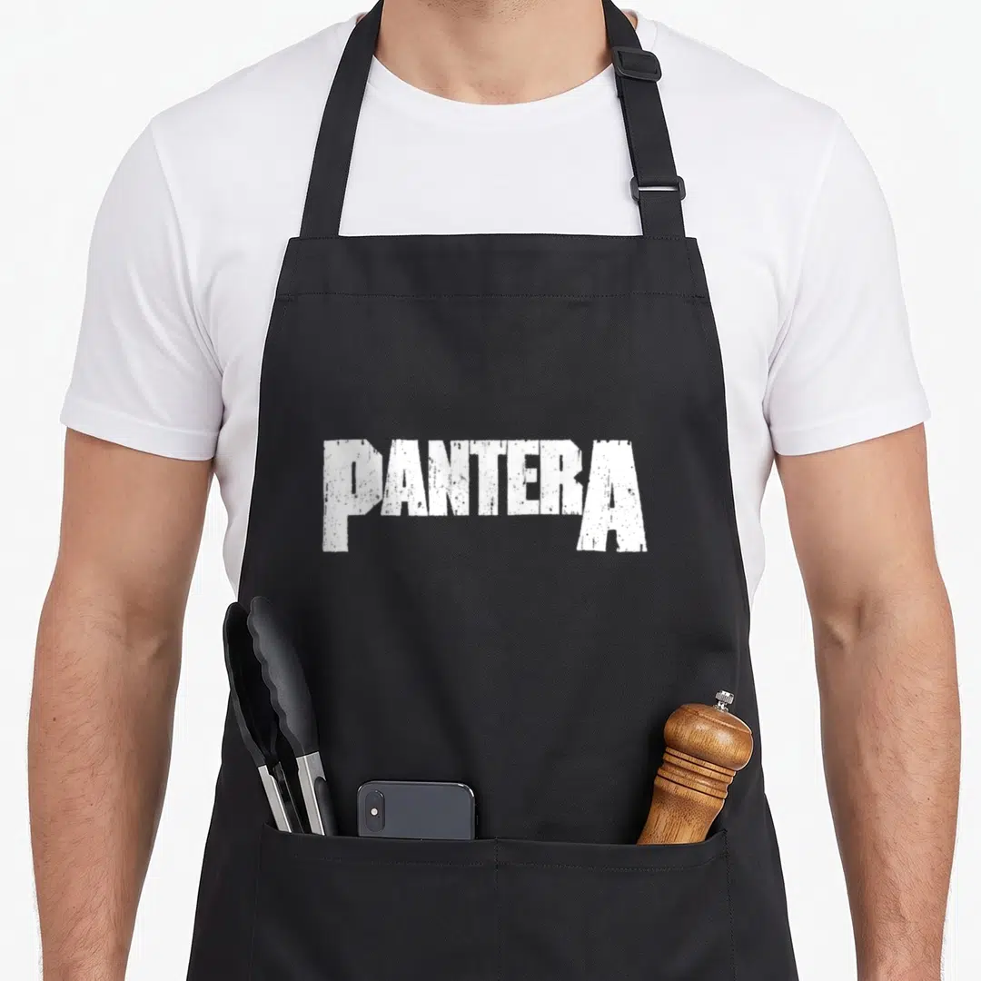 Pantera logo officially apron - White distressed PANTERA text logo on dark background — shown on a black cotton canvas apron against a white background